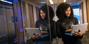 Man forming New York business online on laptop (LLC or Corporation)